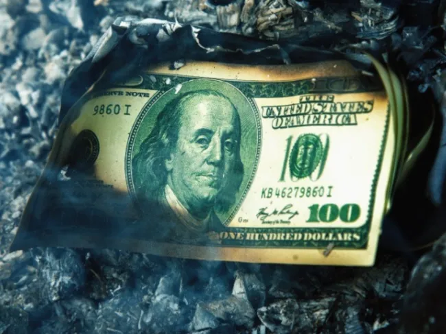 burning dollar bill